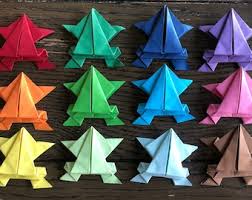 Try looking at patterns for a facet table or perhaps a sideboard. Origami Frog Etsy