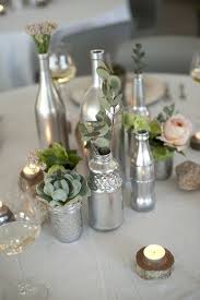 15 Silver Wedding Ideas Rustic Wedding Chic Wedding Reception Centerpieces Diy Diy Wedding Reception Spray Painted Bottles