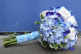 Tuck a sprig or two of a blue flower, like muscari or clematis, for just a. Blue Bridal Bouquets