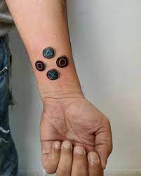 Touch device users, explore by touch or with swipe gestures. World Tattoo Gallery On Twitter Playstation Buttons Tattoo By C Claudia Salvatori
