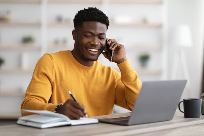 Professional using a laptop for online services