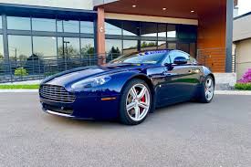 Image result for Midnight Blue 2010 Aston Martin