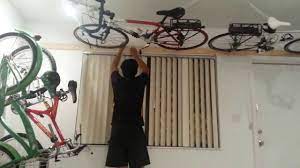 Cheap And Easy Diy Flat To Ceiling Storage Bike Storage Apartment Bike Storage Diy Bike Storage Garage