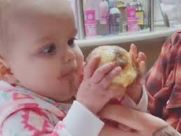 See It Baby Can T Stop Eating And Hugging First Ice Cream New York Daily News