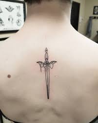 Sword in the stone tattoo designs. 40 Flaunt Your Sense Of Sophistication With These Sword Tattoo Ideas Sword Tattoos For Women Sword Tattoo Minimalist Tattoo