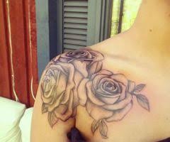 Rose Shoulder Cap Tattoo I Really Want To Get Something Like This On My Shoulder Shoulder Cap Tattoo Tribal Tattoos Belly Tattoos