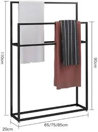 A towel rack can sit on the floor, providing plenty of room for towels. Amazon Com Wing Metal Free Standing Towel Rack Large Towel Holder Stand For Bathroom Kitchen Washroom Free Standing Towel Rack Towel Rack Metal Towel Racks