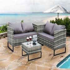 The set has a compact design that makes it suitable for the table features a storage shelf below the tabletop for keeping a food tray or a book. 4 Piece With Storage Box Outdoor Conversation Set Rattan Patio Furnitu The Magic Home
