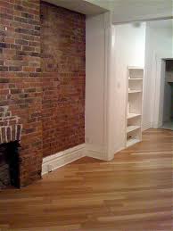 Living Room Exposed Brick Bamboo Hardwood Floors Photo Brick Living Room Bamboo Hardwood Flooring Flooring