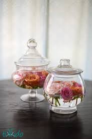 Tidy up your bathroom vanity with a little help from these durable glass apothecary jars. Diy Easy Apothecary Jar And Rose Floral Arrangements Apothecary Jars Decor Apothecary Jars Apothecary Decor