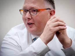 Gifford cuts chiropractic care amid anxiety about health care reform