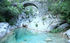 there are waterfall pools on the roya river at fanghetto in a narrow channel below a roman bridge on the italian border there are pool swimming travel france