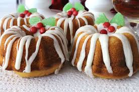 Classic sponge bundt cake recipe, using the batter fill the bundt cake pan and also make 1 cupcake. Christmas Mini Bundt Cakes Two Sisters