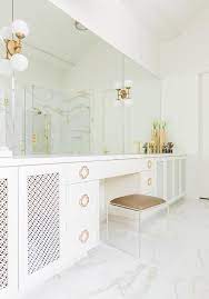 The glazed subway tub and shower surround adds another layer of 1930s charm. Hollywood Regency Bath Simple Bathroom Remodel Bathrooms Remodel Guest Bathroom Remodel