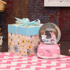 Or create the perfect kids valentine's gift by filling up mini treat buckets with their favorite sweets, small toys and more. Tied Ribbons Valentine Gift For Wife Girlfriend Girls Globe Couple Gifts Combo Snow Globe Couple Figurine Showpiece And Gift Box Buy Online In Antigua And Barbuda At Antigua Desertcart Com Productid 178562254