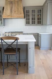 Once you've made the decision to paint your kitchen cabinets grey, the hardest part begins, which is deciding on a paint color. Grey Farmhouse Kitchen Custom Barnwood Hood Open Concept Cottage Kitchens Modern Farmhouse Kitchens Kitchen Cabinet Interior