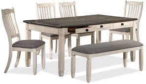 This traditional wooden dining table will match any décor with its dark oak tabletop and antique white legs. Harold 6 Piece Dinette Set Antique White Leon S