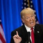 President Trump denies using phones