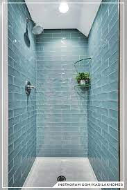 Like idea of pattern tile. The Textured Surface And Calming Blue Color Bring Blue Bring Calming Color Subwaytiles Surf Subway Tile Showers Shower Tile Bathroom Remodel Master