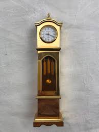 We will acquire these clocks and. Sold Price Alanlorenzo Gold Toned Mini Grandfather Clock November 4 0118 11 00 Am Est