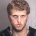 Man arrested after allegedly pushing girlfriend off second-floor balcony