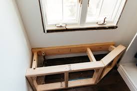 Diy a wooden baseboard heater cover as a great way to modernize old dated covers for way less money than buying them to custom fit. How To Build A Radiator Window Bench Erin Kestenbaum