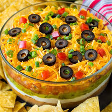 These funeral potatoes are the only cheesy potato casserole recipe you will ever need and my number one requested recipe! 7 Layer Dip Recipe Dinner At The Zoo