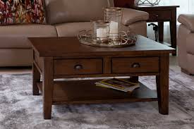 The table has an elegant design that complements your home decor. 2 Drawer Dark Pine Coffee Table Henley Ez Living Furniture