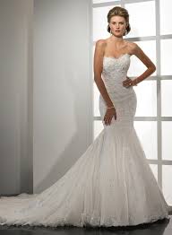The trumpet wedding dress is very similar to the mermaid wedding dress except that the bodice begins to flare away from the body at about what fabrics are trumpet or mermaid wedding gowns made with? Mermaid Trumpet Style Wedding Dresses Weddings