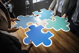 With these 10 sites, you can find free easy crosswords to print, puzzles, and other resources to keep you bus. Four People Holding Blue Puzzles Nohat Free For Designer