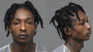 Drugs, guns and cash seized after chase that ends with car crashing into  house