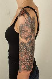 Sleeve tattoos for women, which include imaginative tribal leaf designs inspire growth that does not limit creative thinking. Lower Half Sleeve Tattoos Womens Novocom Top