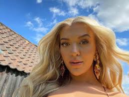 Molly Marsh shows off huge biceps as she updates fans