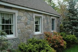 Stone veneer is available in two different styles: Natural Stone Veneer Siding