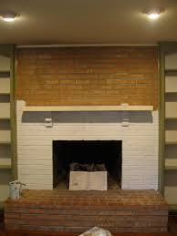 A whitewash brick fireplace is a classic choice, but a black painted fireplace adds drama. Painting A Brick Fireplace A Girl S Guide To Diy