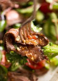To assemble the salad, place the mixed greens on a large platter. Thai Beef Salad Recipetin Eats