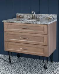 You can also go for a wooden or metal cabinet with a stone countertop for durability, it looks cool. Premier Cabinet Series Yorkshire 36 Hairpin Leg Vanity Ensemble
