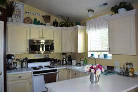 This is more achievable for those with higher ceilings and kitchen cabinets that match that height. Enjoyable Inspiration Martha Stewart Decorating Above Kitchen Cabinets Stunning Decorating Above Kitchen Cabinets Above Kitchen Cabinets Kitchen Cabinets Decor