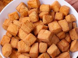 Shankarpara, crispy diamond-shaped fried snack pieces, golden brown, served in a bowl