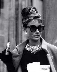 Audrey hepburn gives one of her most stylish and iconic performances in this charming if slightly sentimental version of truman capote's famous novella. What Sunglasses Is Audrey Hepburn Wearing In Breakfast At Tiffany S Sunglasses And Style Blog Shadesdaddy Com