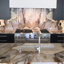 These stunning ceramic tiles have a handcrafted zellige look that is majorly trending with designers and interior lovers! Patagonia Luxury Kitchen Design Stone Decor Dining Room Interiors