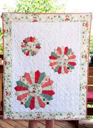 This is a simple version for beginning quilters that is beautiful and easy to sew. Over 20 Dresden Plate Quilt Patterns