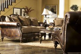 Flowing With The Rich Beauty Of Old World Design The Claremore Antique Upholstery Collection Feature Living Room Sets Furniture Ashley Furniture Living Room