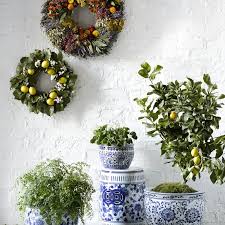 Ceramic lemon drop rainbow floral planter features a yellow colored finish around the rim with a vibrantly colored floral design that can brighten any room. Blue White Ceramic Small Planter Williams Sonoma