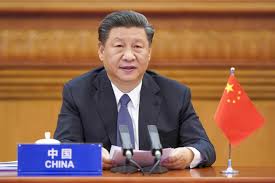 China's President Xi Jinping looks ...