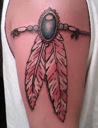 A tattoo of an eagle feather means that the wearer is a brave and courageous person. Stunning Native American Feather Tattoo Meanings Ideas Tatring