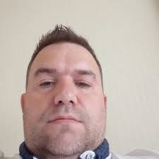 We have a small living room, so we moved our tv to a corner of the room.  How would you decorate the walls behind it?