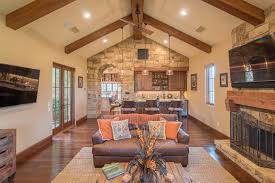 Building quality timber frames and post & beam structures throughout the u.s. Mediterranean Open Plan Living Room With Exposed Beam Vaulted Ceiling Hgtv