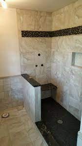 Glass Mosaic With Black Pebble Rock On The Shower Floor Tile Pebble Tile Shower Floor Pebble Tile Shower Black Pebble Tile Shower Floor