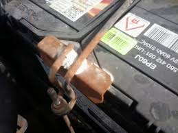 Car battery corrosion is the unsightly piling up of a whitish or bluish substance on and around the car battery terminals. White Powder Forming On Battery Hold Down Bracket Motor Vehicle Maintenance Repair Stack Exchange